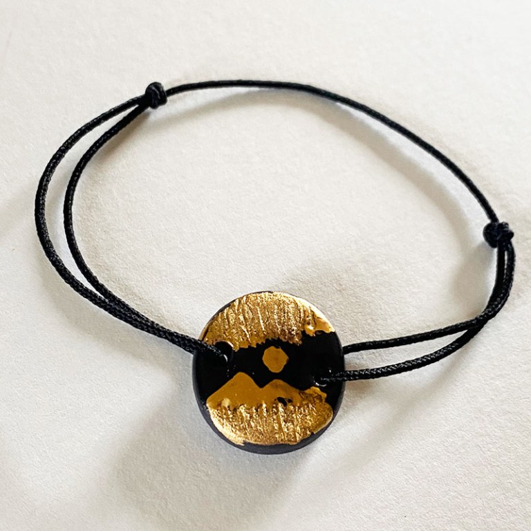 Bracelet lien noir/or